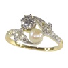 Vintage Belle Epoque diamond and pearl romantic toi-et-moi engagement ring